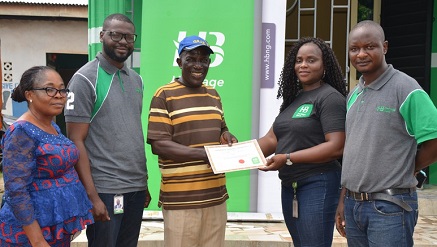 (L-r): Roseline Hunyigan, head of Agent Banking, Heritage Bank Plc; Yusuf Adeojo, an agent, owner of Thy Grace, Corner Shop; Hunyingan Mifrinso, zonal business coordinator, South-West, South-South, Agent Banking, Heritage Bank; Oluwakemi Adewunmi and Daniel Ude,, experience centre manager, during the commissioning of Thy Grace one of Heritage Bank’s Corner Shop at Mowo Local Government, in Badagry.